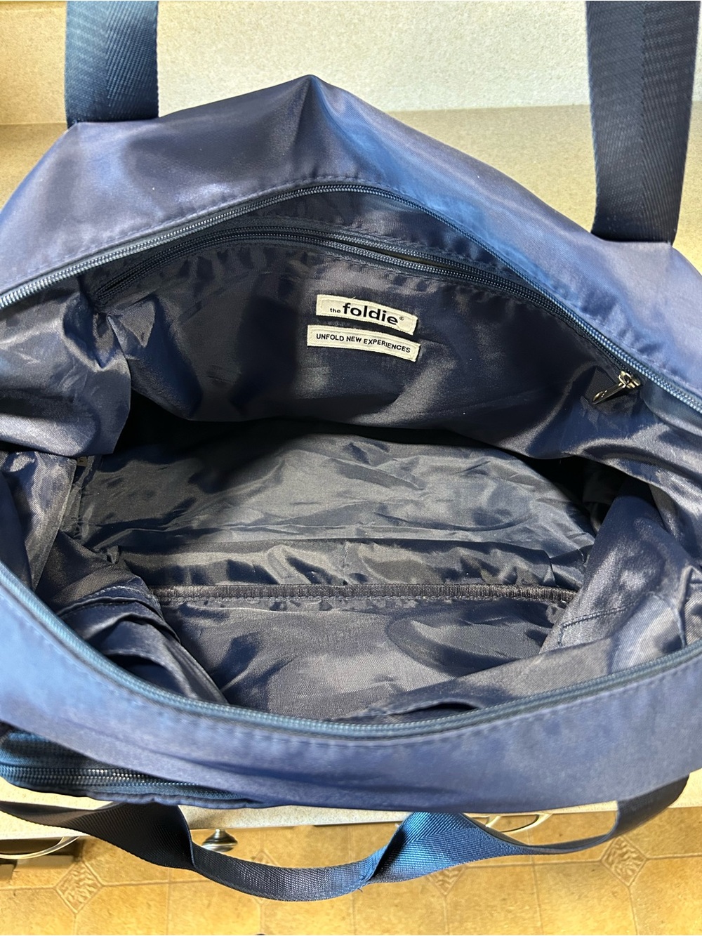 The Foldie Travel Bag Zip Closure Foldable Navy Expandable Carry-On Tote - Picture 3 of 7